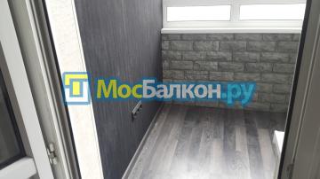Комбинированная обшивка искусственным камнем 